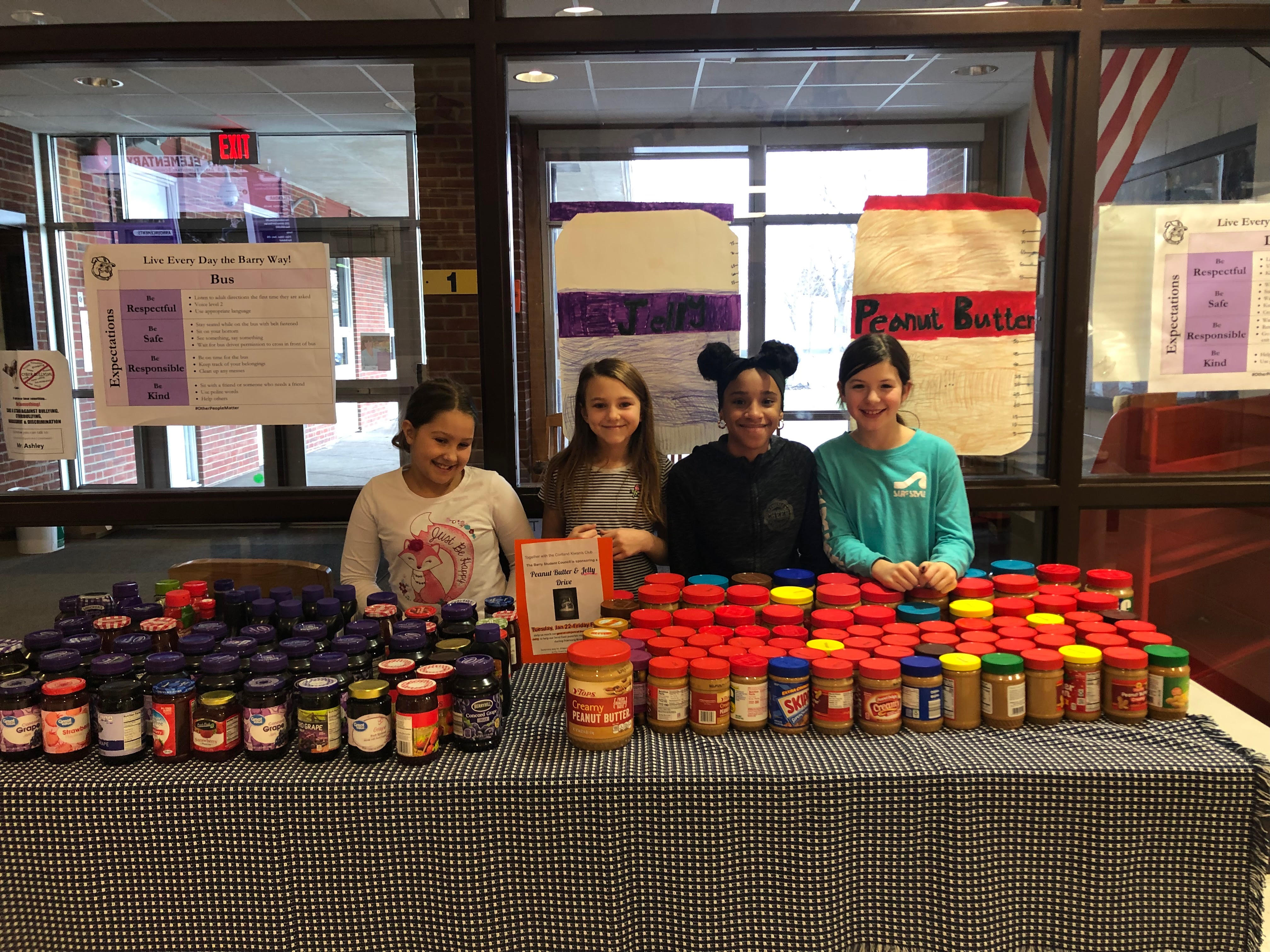 students show off impressive amount of donations for pb&j drive