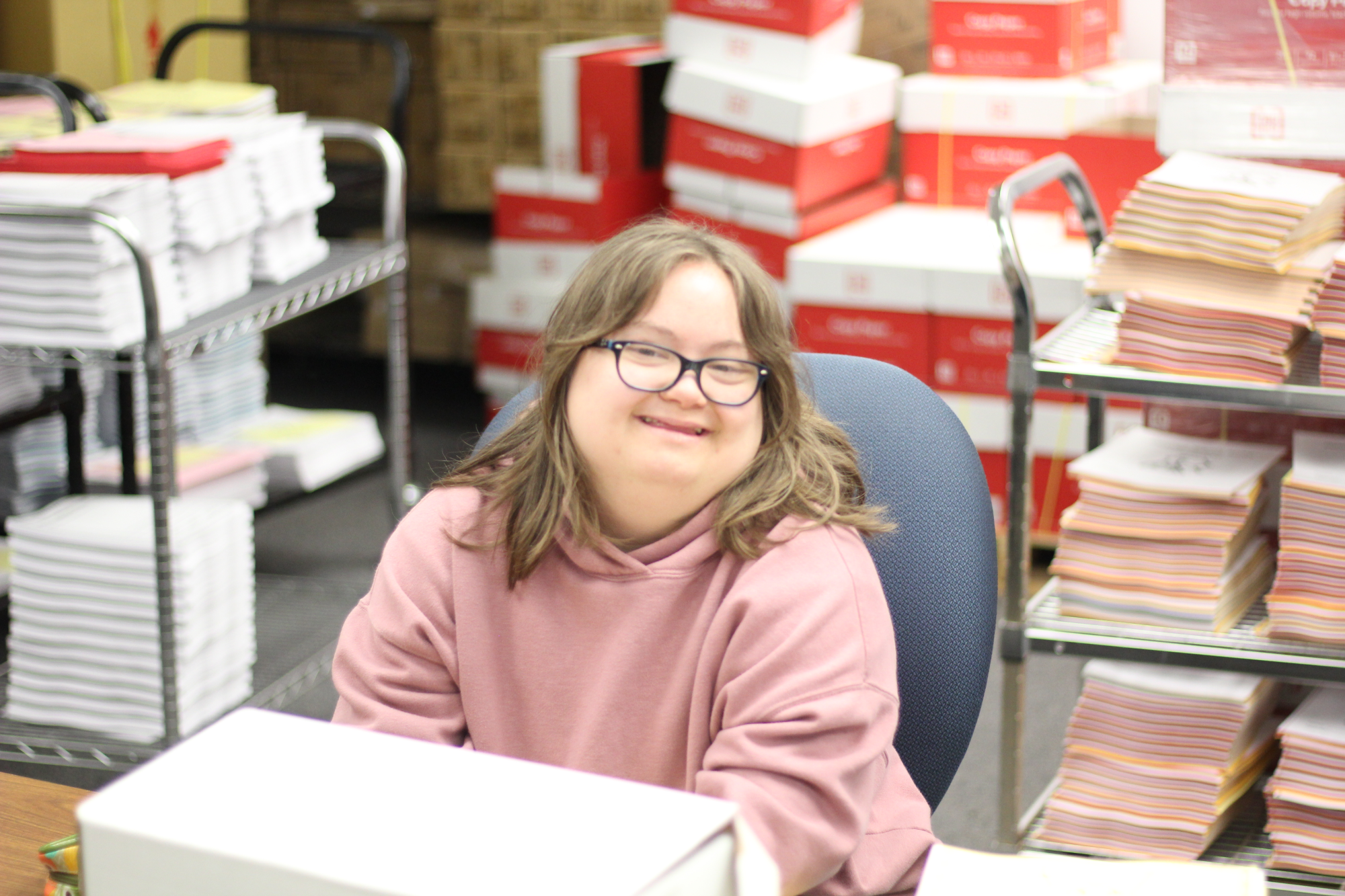 print shop helper sophia smiles brightly