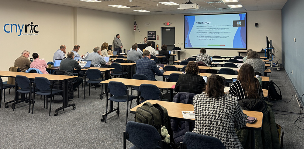 tech collaborative members sitting during presentation