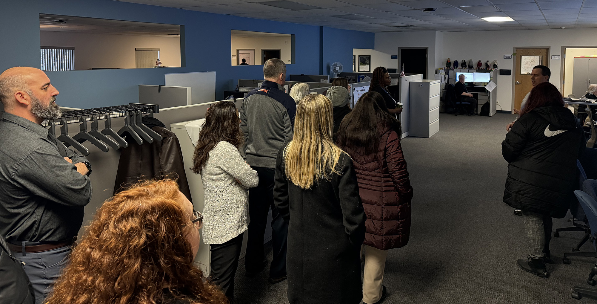 visitors take a trip to the network operations center