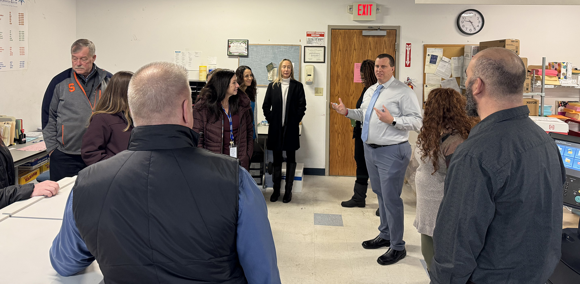 visitors make another stop at the print shop to learn about production