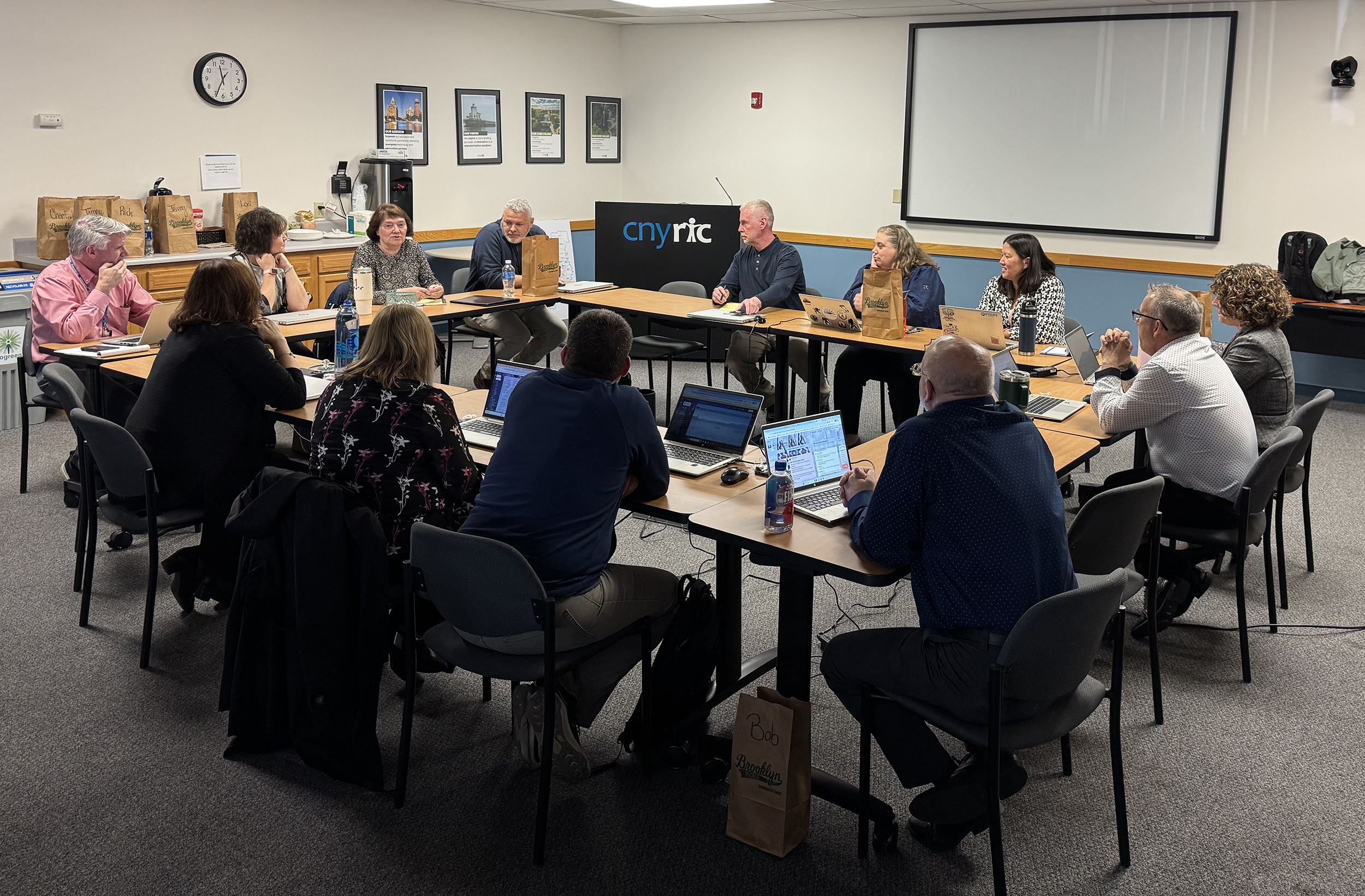 members of the cnyric eds team meet with members from edutech to discuss data facilitation and reporting
