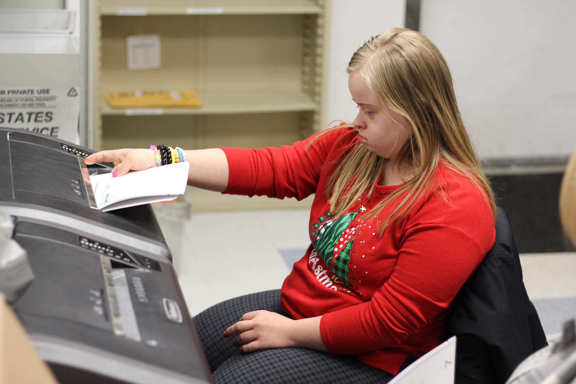 ava hard at work shredding documents