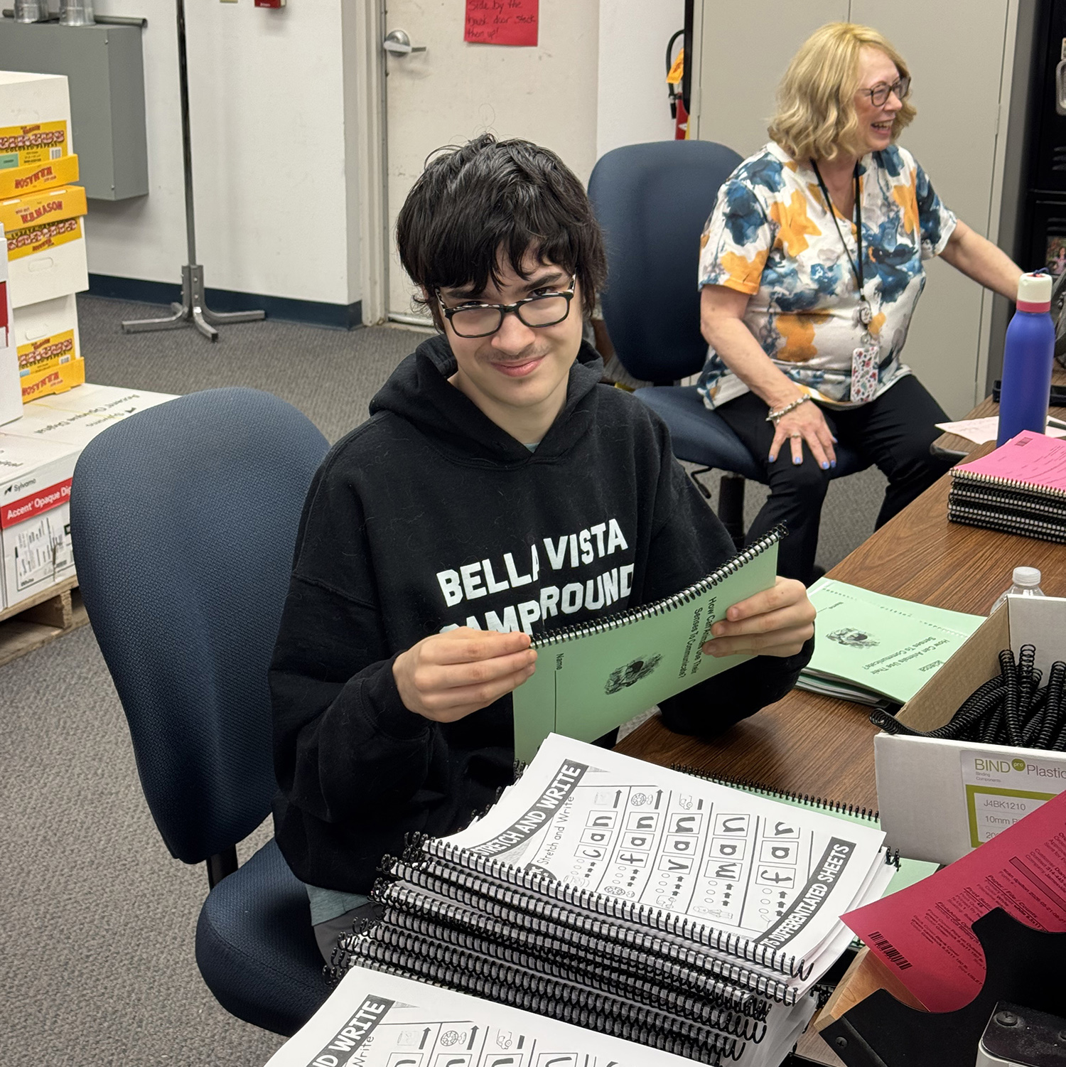 lucas getting ready to compete with michael over who can coil more books!