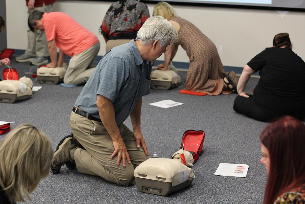 cnyric employees applying electrode pads for aed practice
