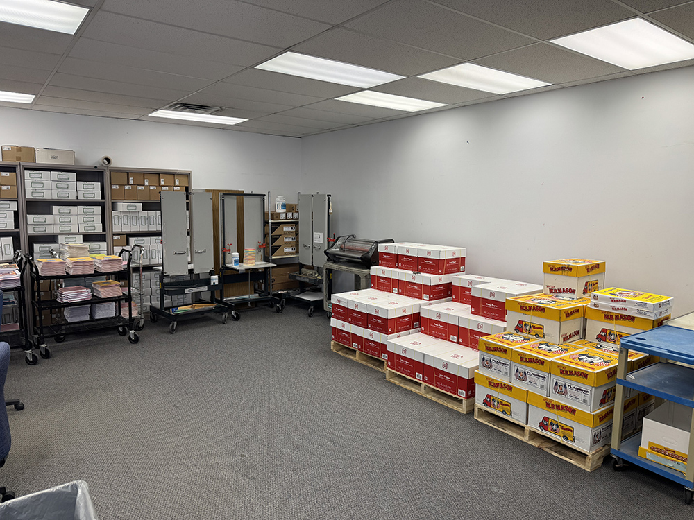 binding room after reorganization, looking tidy and yielding far more available space