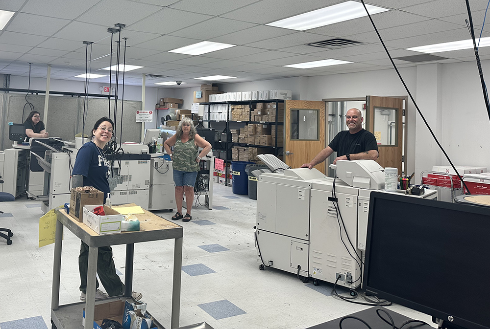 print shop team working hard to make things even better!