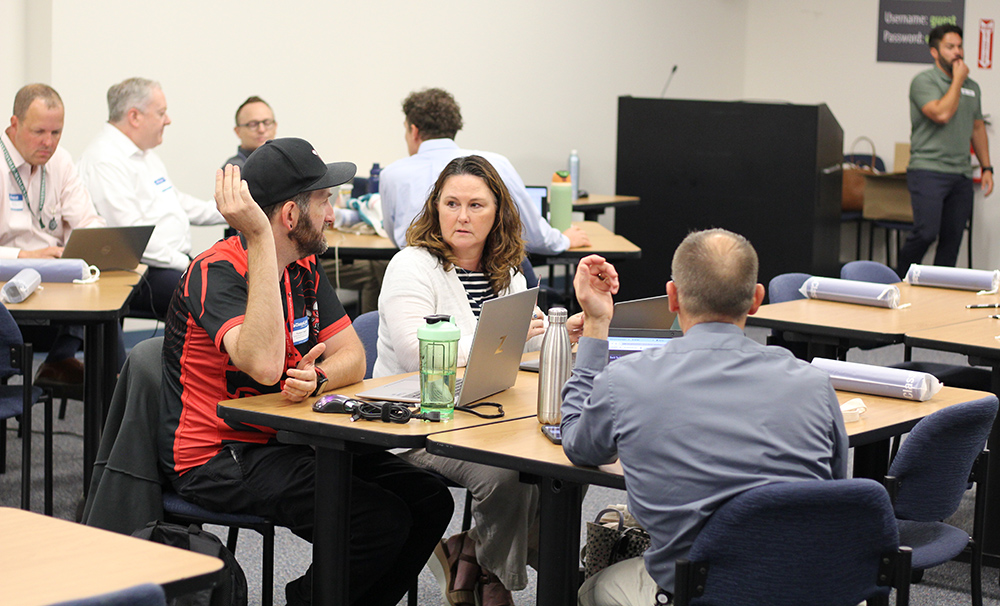 district attendees discussing classlink