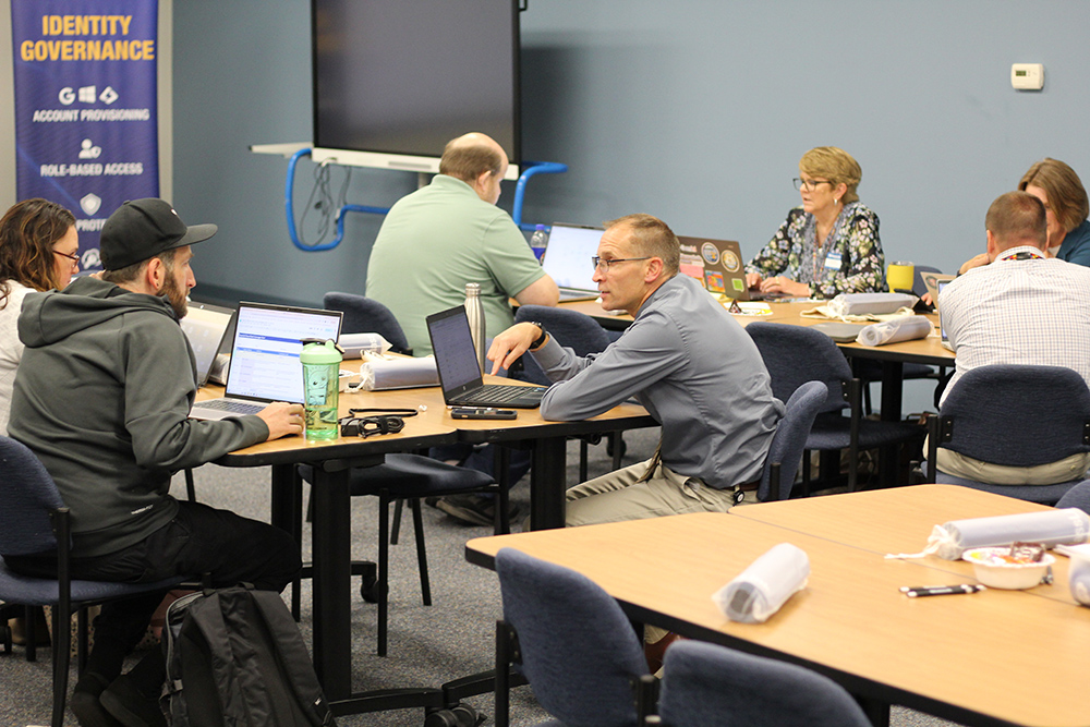district attendees collaborating on brainstorming exercises